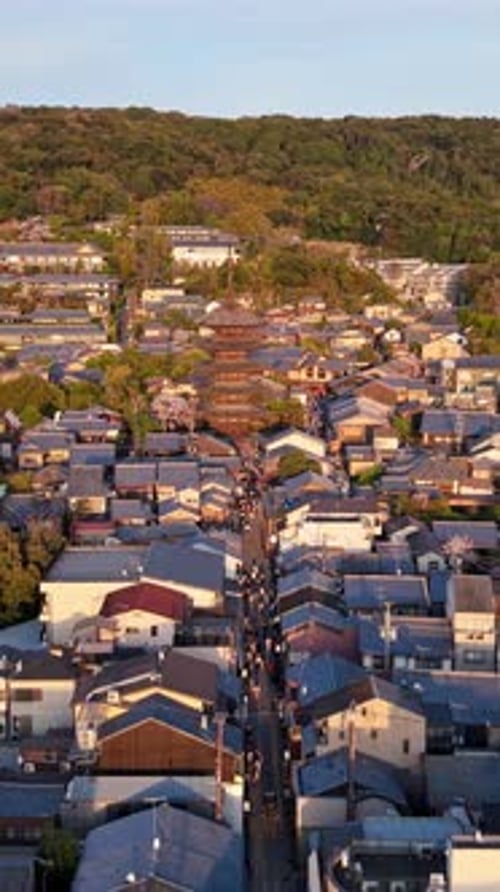 Aerial drone view of the Yasaka Pagoda temple in daylight in Kyoto, Japan