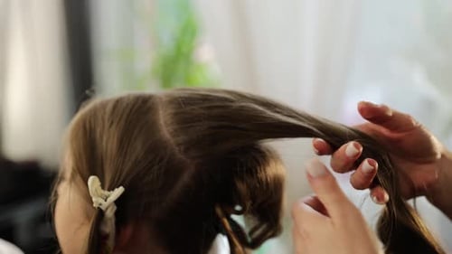 Woman Getting Her Hair Styled, Close Up
