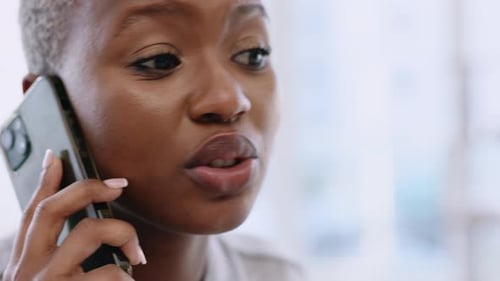 Woman Talking on Smartphone in Close-Up Indoor Shot