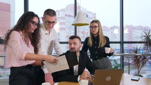 Business Colleagues Work Together in Modern Office