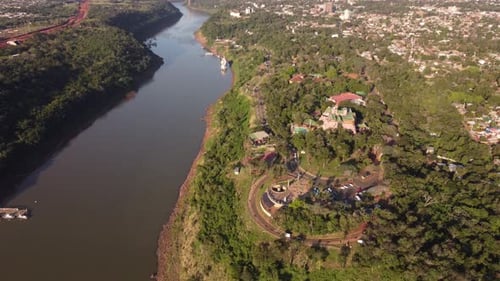 Hito Tres Fronteras Monument in front of Iguazu River connecting Brazil, Paraguay and Argentina at s