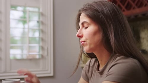 Close up of woman stressed out from remote job.