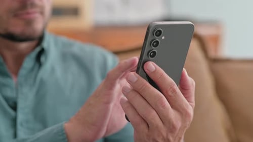 Close up of Man Using Smart Phone