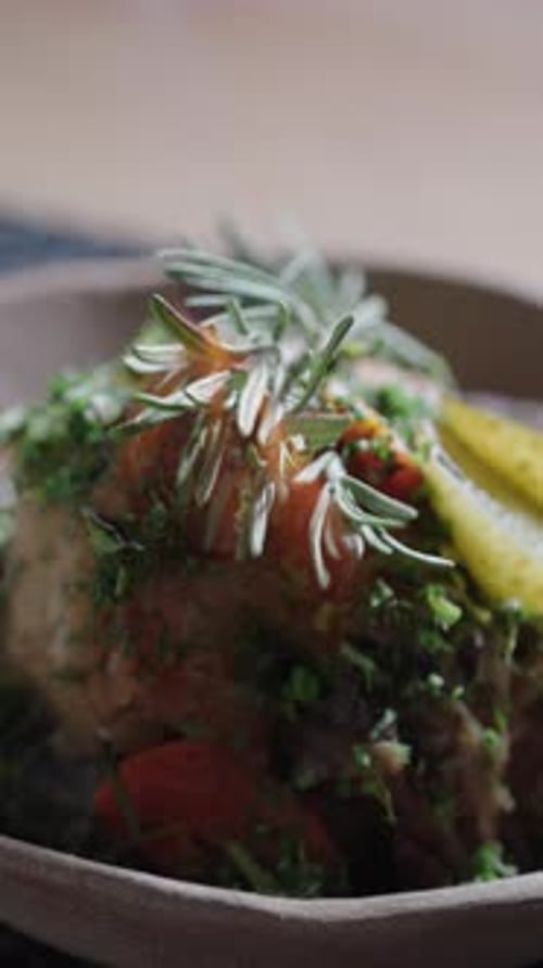 Delicious Dish Topped with Rosemary in Bowl