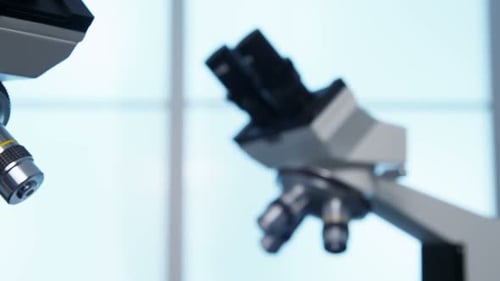 Closeup of Microscopes in Science Lab Analyzing