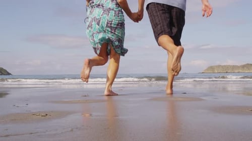 Couple Running Out to Ocean, , Costa Rica
