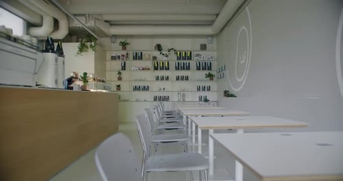 Coffee Shop with Modern Interior Tables Comfort Chairs and Counter