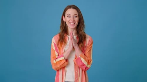 Surprised Woman Reacts to Unexpected News From Interlocutor