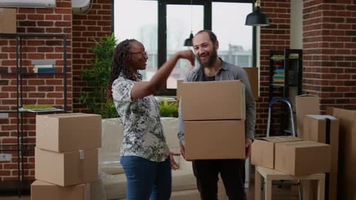Positive Homeowners Celebrate Buying First Home Together