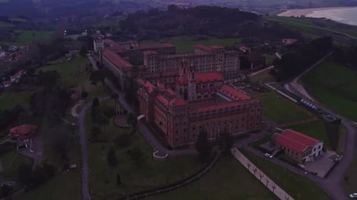Aerial view of University Center and historic buildings at sunset, Spain.