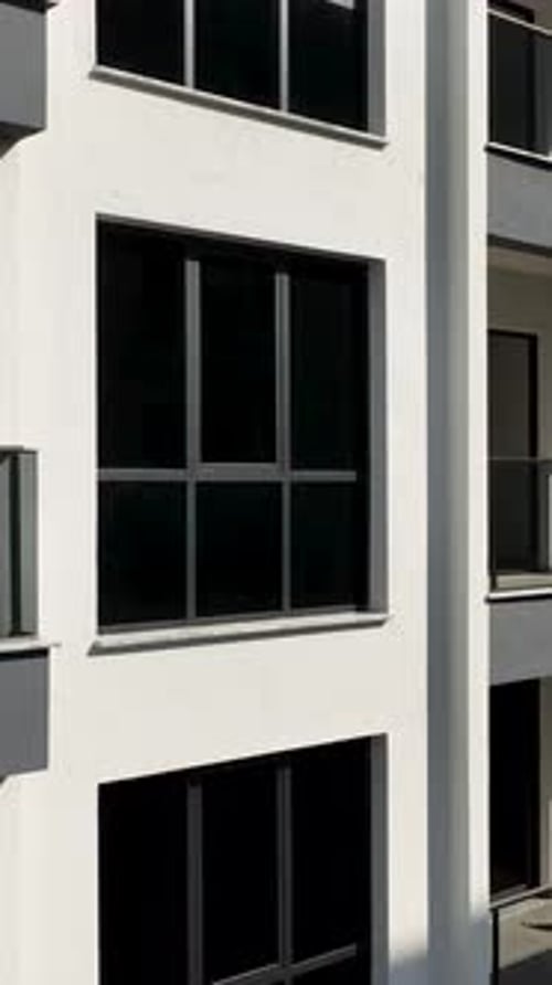 Modern Architecture Building With Dark Windows