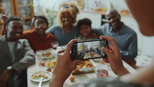 Family Gathering Poses for Photo Together Indoors