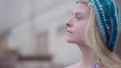 Woman in Knit Cap Looking to the Side