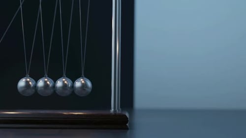 Closeup Loop Newton's Cradle Pendule Swing in Business Moment
