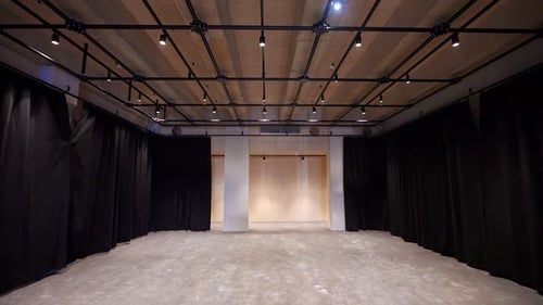 Lots of Black Draperies in the Rehearsal Hall