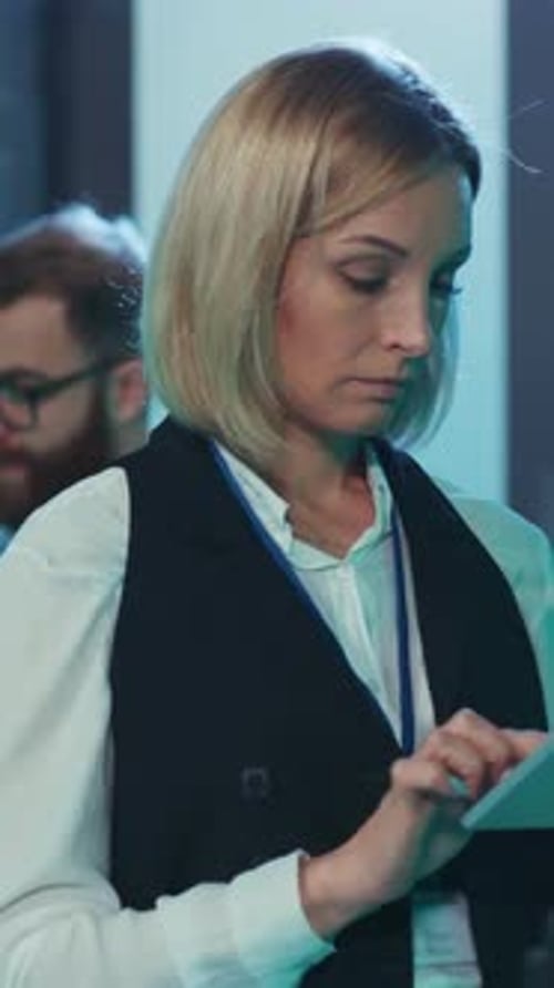 A Professional Woman Actively Engaged in Her Work Within a Modern Office Setting