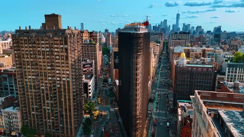 Flatiron Building under reconstruction covered with dark net. Famous architecture of New York
