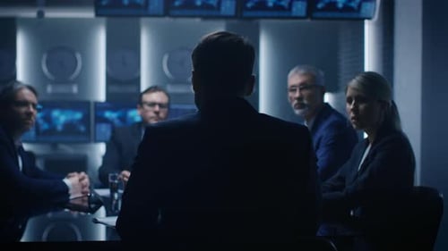 Business people at boardroom table in modern office