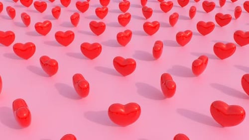 Red Glossy Hearts Pattern Loop on Pink Background