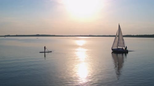 Wonderful Lake Water Activities Group of Young Tourists Sailing on White Yacht While One Guy