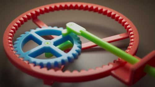 Looping 3D animation multi-colored plastic toy gears.