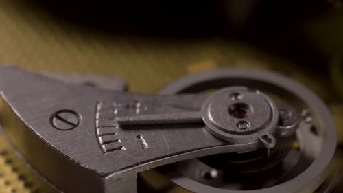 Antique Watch Mechanism Spinning Macro Close-Up