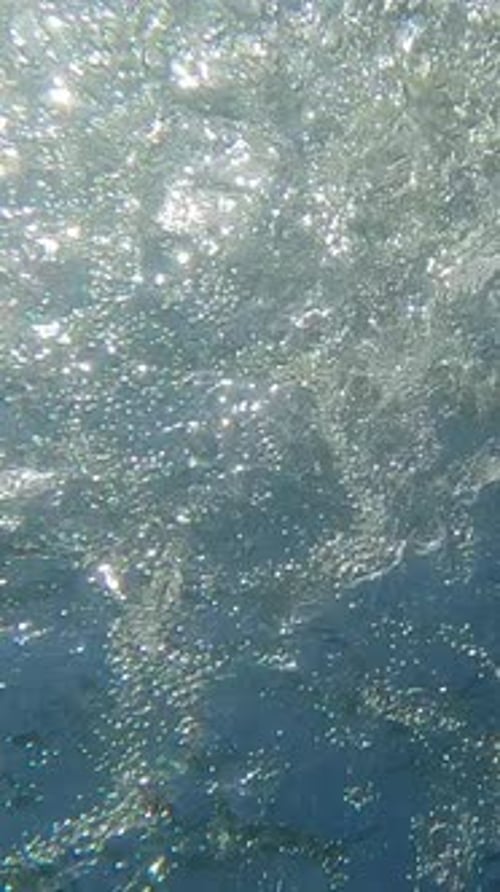 Underwater view of sea water and bubbles