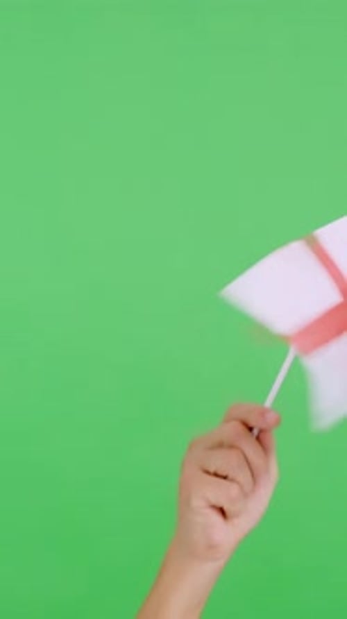 Hand Holding England Flag on Green Screen