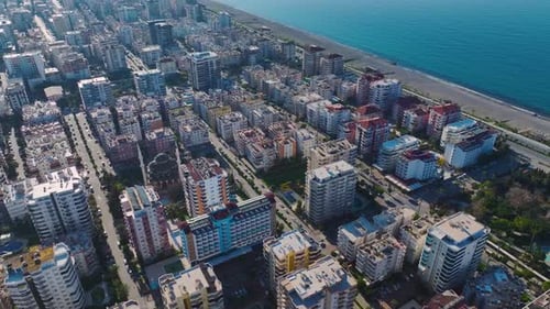 Coastal Cityscape With Beach and Apartment Buildings