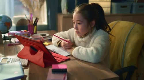 Schoolgirl Studies on Tablet