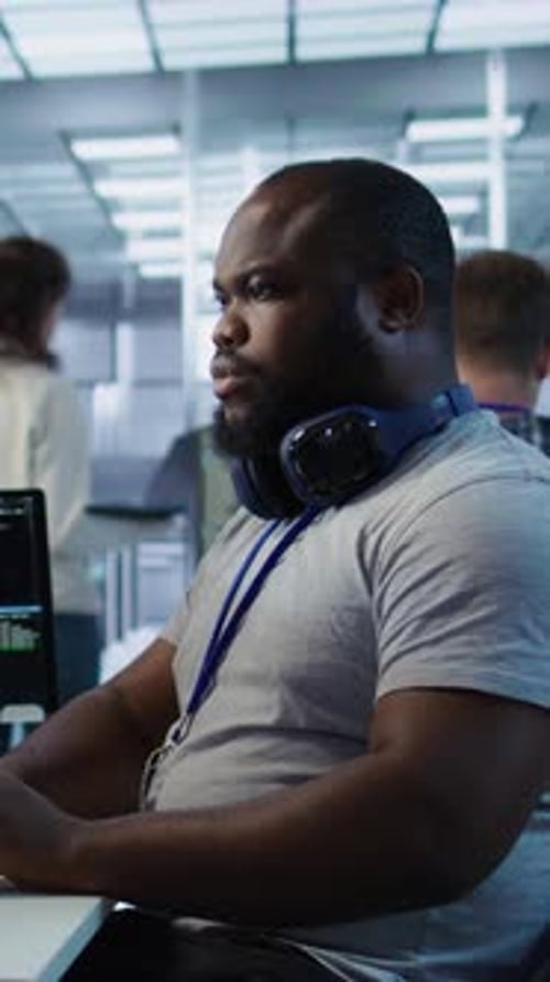 Engineer Tasked with Monitoring Data Center Supercomputers