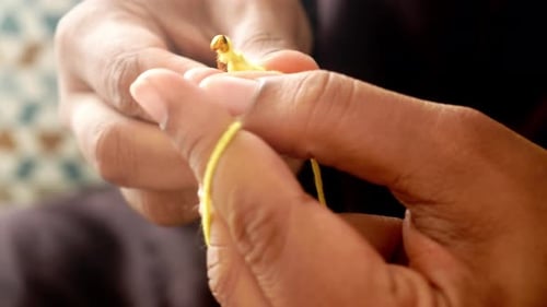 Hand Close Up Crocheting with a Hook Wool Yarn Creative Craft