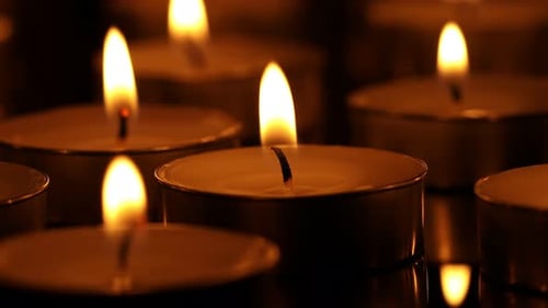 Candlelight Glow: Warm, Flickering Flames in the Darkness