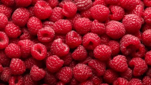 Fresh ripe raspberries as background, top view