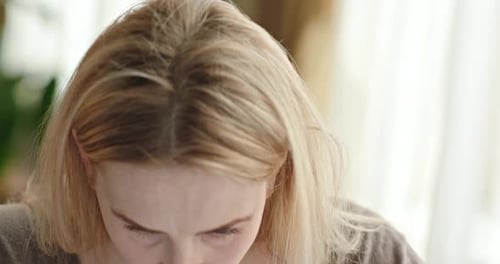 Angry Woman Scowls and Bares Teeth Close Up