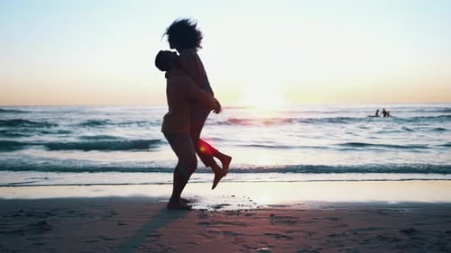 Hug, sunset and couple with silhouette, beach and adventure with commitment, travel and marriage