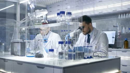 Scientists Perform Lab Tests in Bright Environment