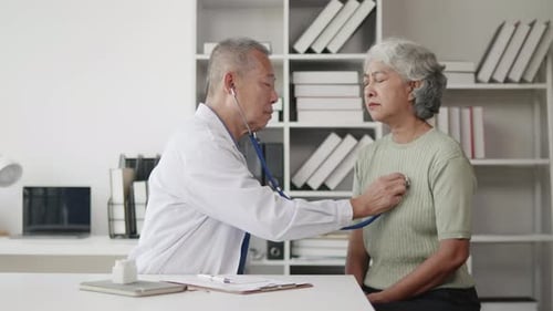Doctor Examining Senior Woman with Stethoscope