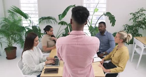 4k video footage of a group of businesspeople having a meeting in an office