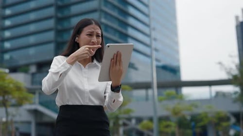 Frustrated Female Business Manager Standing Near Office Screaming On Online Meeting In Zoom With