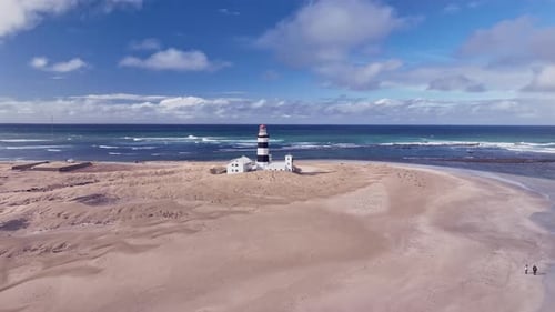 Birds Eye view of beautiful coastline with lighthouse
