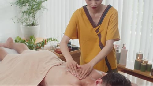 Man Receiving Relaxing Massage at Spa