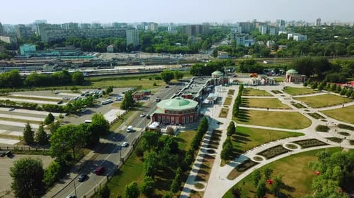 The City From a helicopterCreativeA Beautiful City Center in Which Houses Buildings Bright Trees and