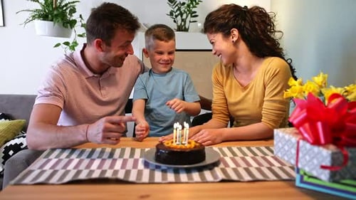 Happy Family Celebrating Birthday at Home