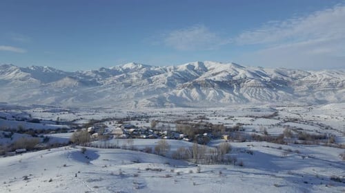 Aerial village view in winter