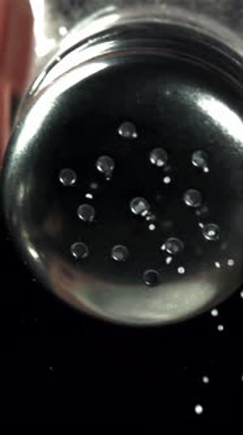 Salt Flies Out of the Salt Shaker Filmed on a Highspeed Camera at 1000 Fps