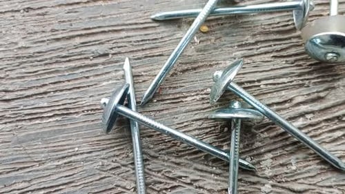 close up of thumbtacks 4k