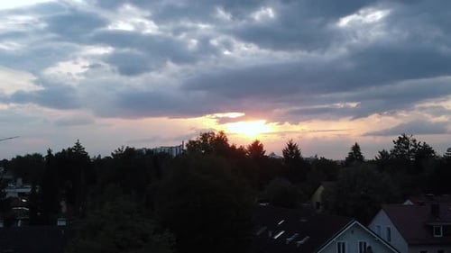 Morning sun above the city.
