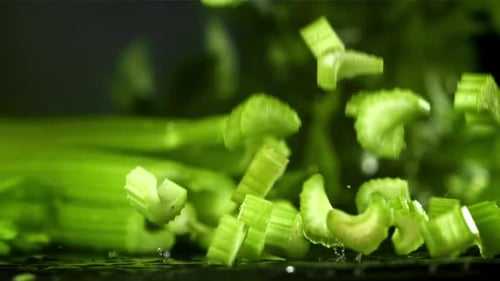 Pieces of Chopped Celery Fall on the Table Filmed on a Highspeed Camera at 1000 Fps
