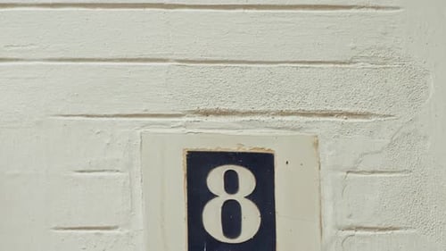 Number 8 (eight) Affixed to a Building